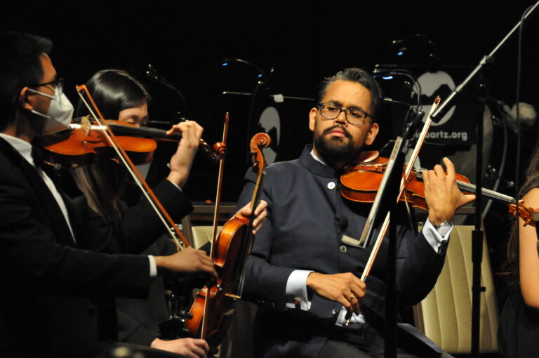 Vijay Gupta performs with the Oklahoma Arts Institute Orchestra.